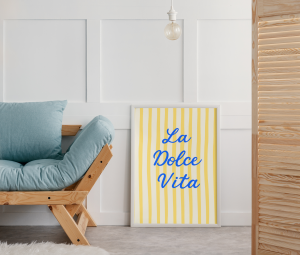mockup-of-an-art-print-placed-on-the-floor-by-a-wooden-sofa-36334-r-el2 (1).png