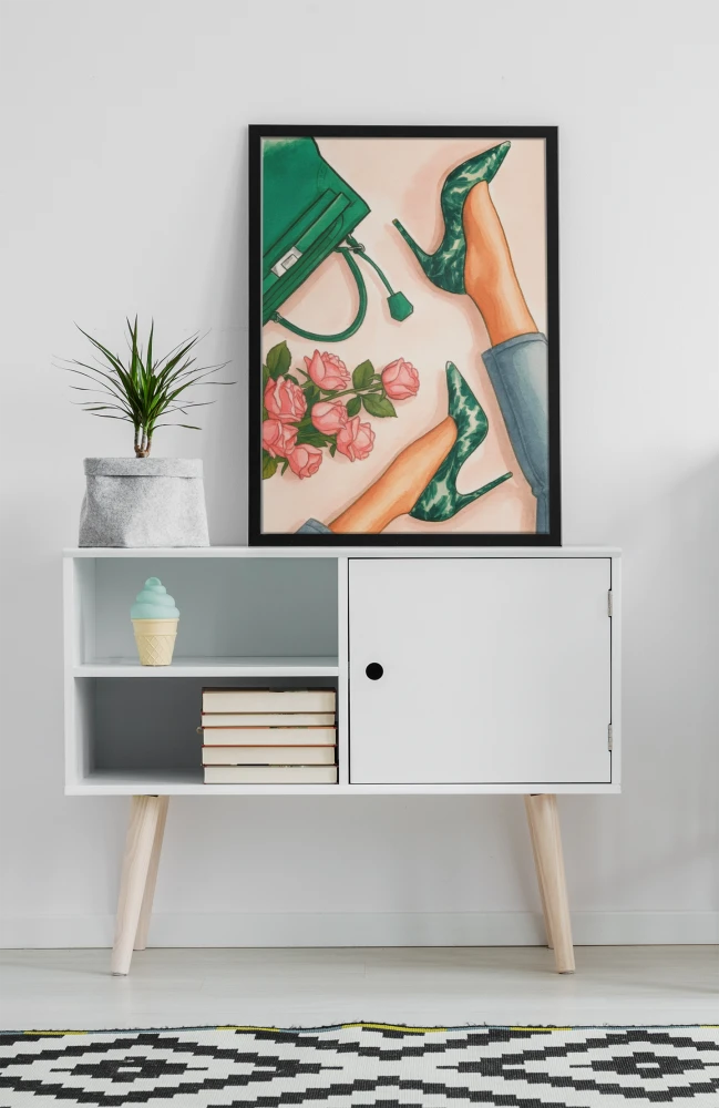 mockup-of-an-art-print-placed-on-a-minimalist-furniture-with-a-plant-38693-r-el2 (1).png